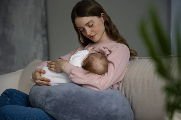 side-view-mother-with-cute-newborn